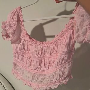 Pink/sheer cropped off the shoulder